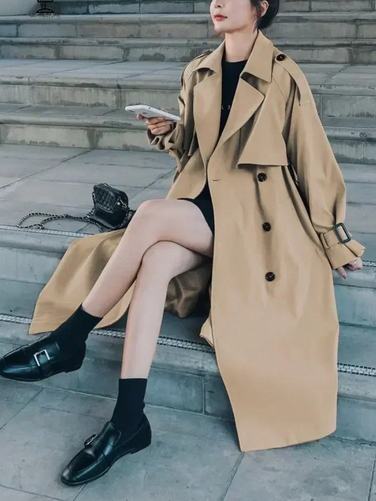 Women's Elegant Sustainable Long Trenchcoat with Adjustable Belt and Puffed Sleeves